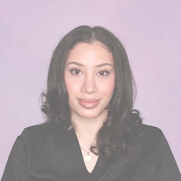 Portrait of a woman with wavy hair.