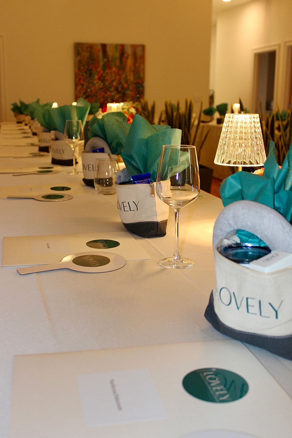 Elegant dining setup with gift baskets and decor