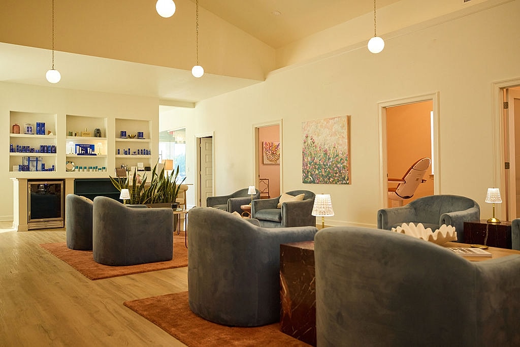 Modern spa lounge with comfortable seating.