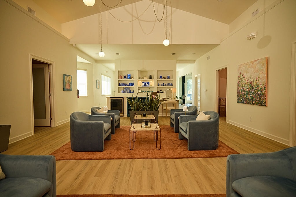 Bright, modern living room with comfortable seating.