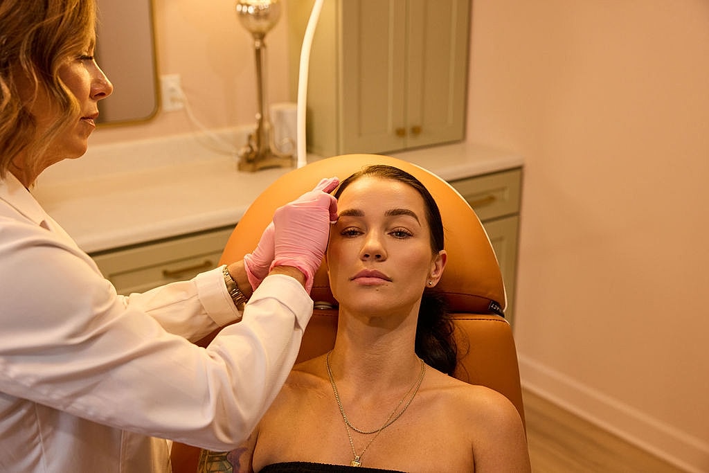 Cosmetic treatment session in a clinic setting.