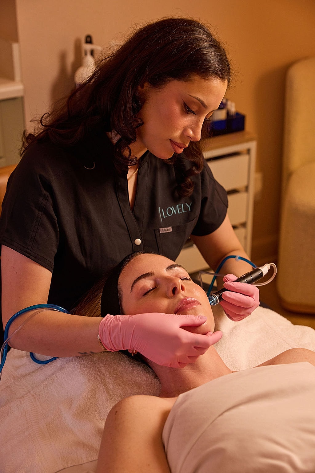 Facial treatment in progress at a spa.